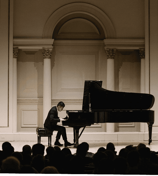 Lionel Yu performing at a concert venue